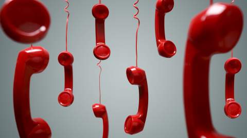 Red telephones hanging up